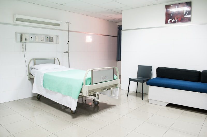 Clinic treatment room with patient bed